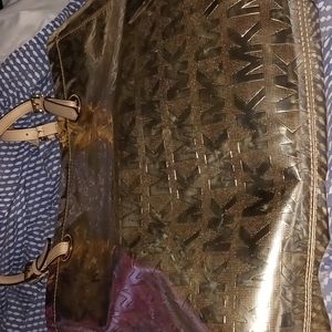 MK PURSE golden hand bag